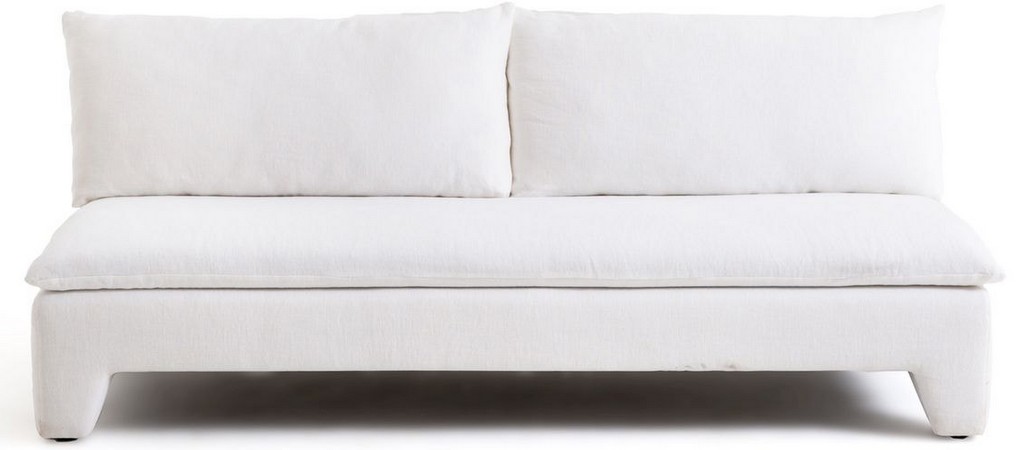 Un salon avec un canapé blanc - Joli Place