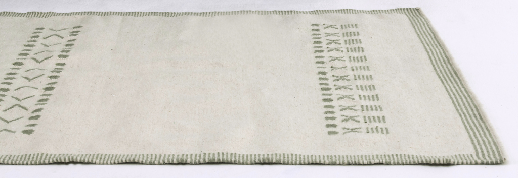 tapis vert et blanc