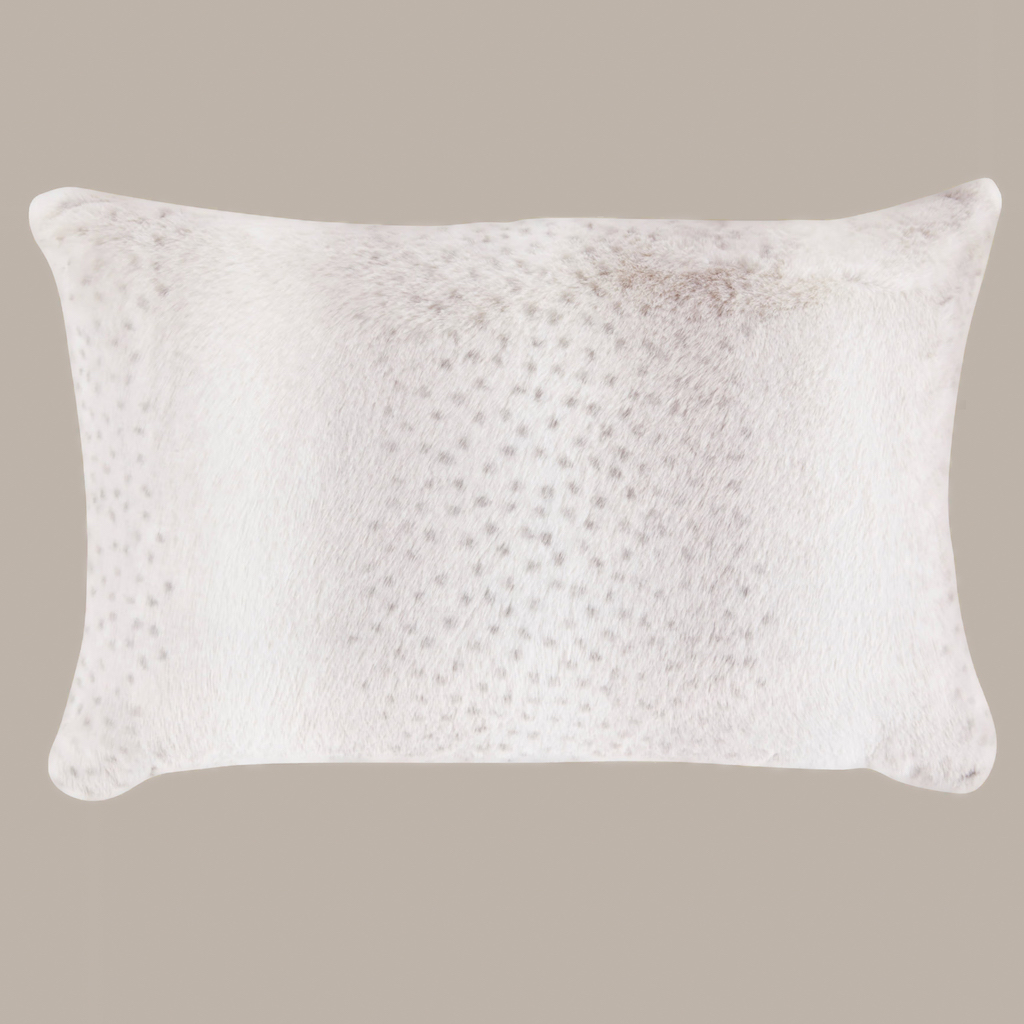 coussin en fausse fourrure balnc et beige